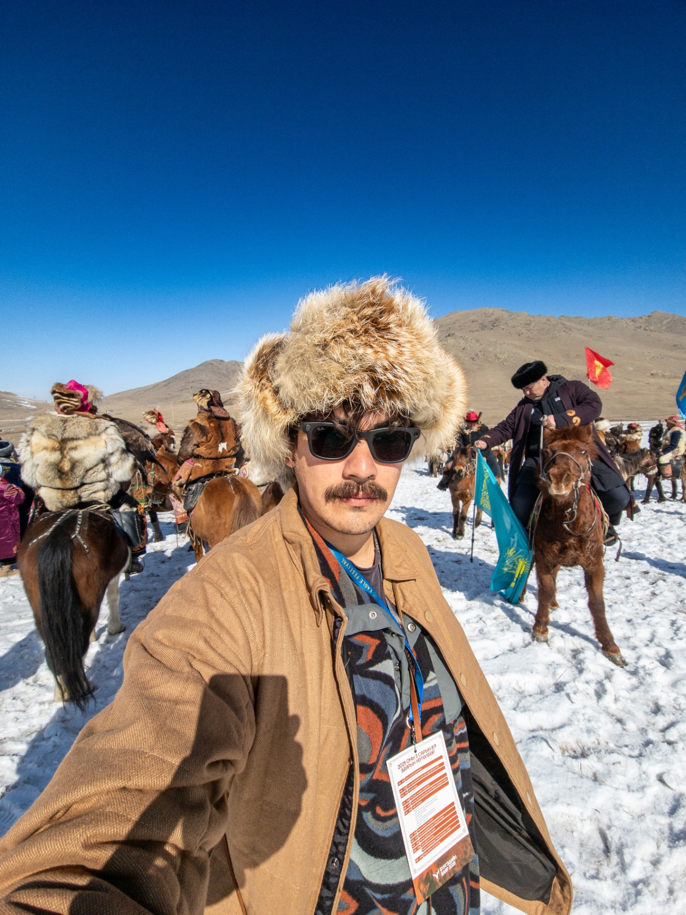 Jason among riders at Mongolia's Golden Eagle Festival